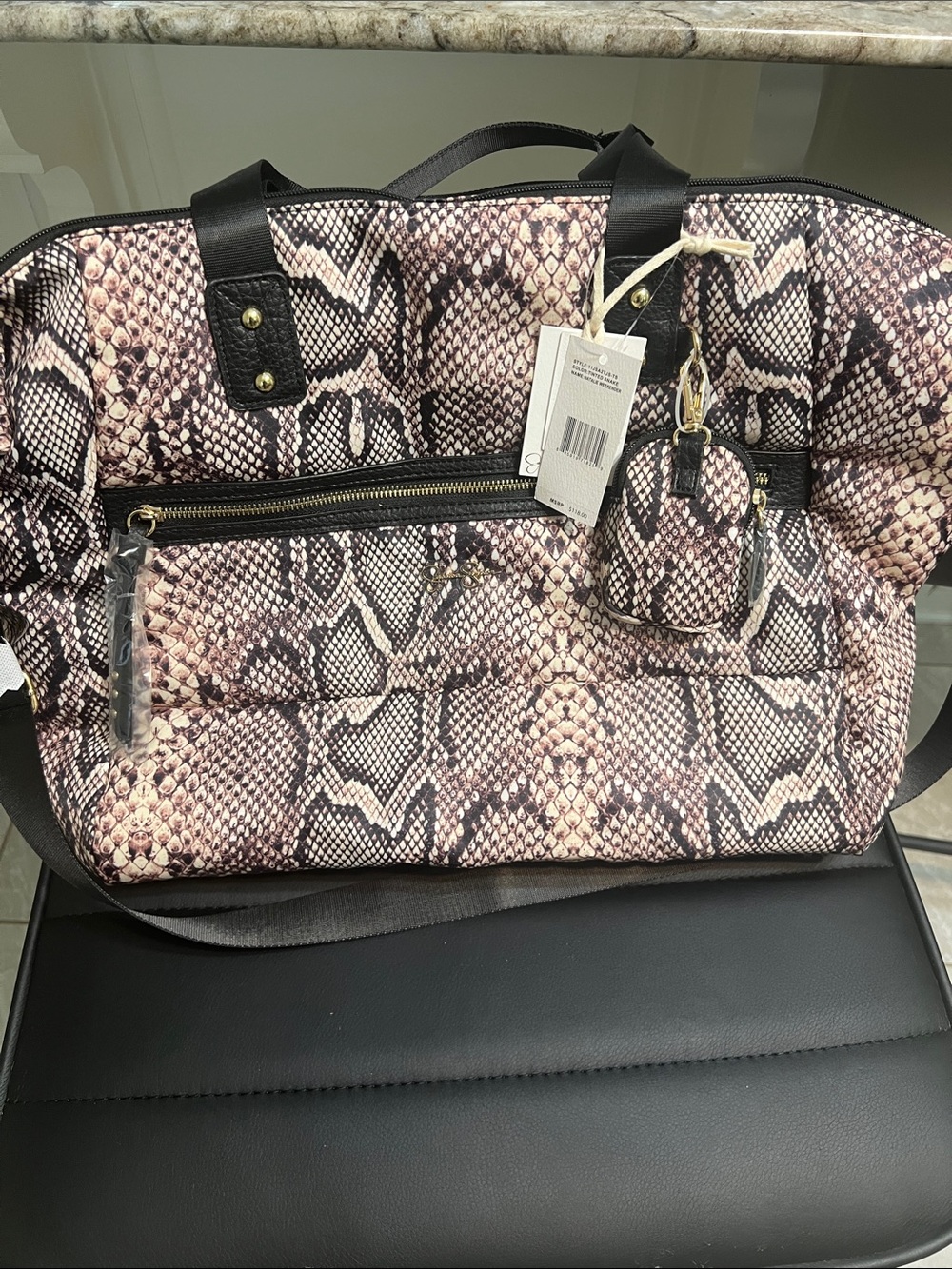 Jessica Simpson Pink and Black Python-Print Travel Tote
